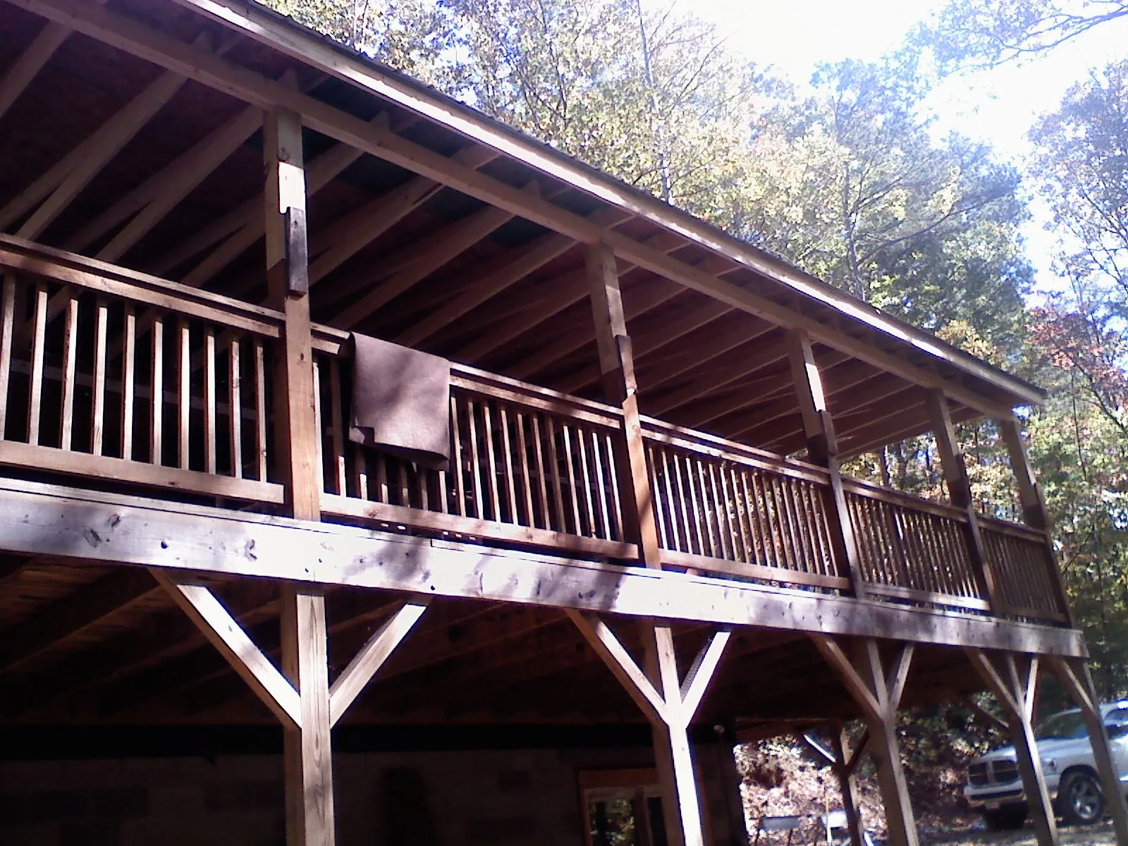 Timber framing under a new elevated porch and deck — Roof Leak Repair in Erving by Roofing Brothers